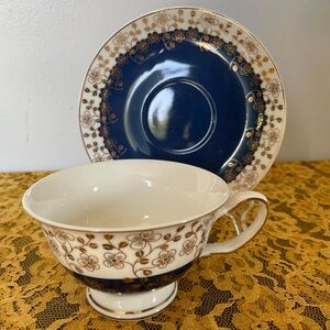 NWOT Grace Fine Porcelain Elegant Blue and Gold Floral Teacup and Saucer Set